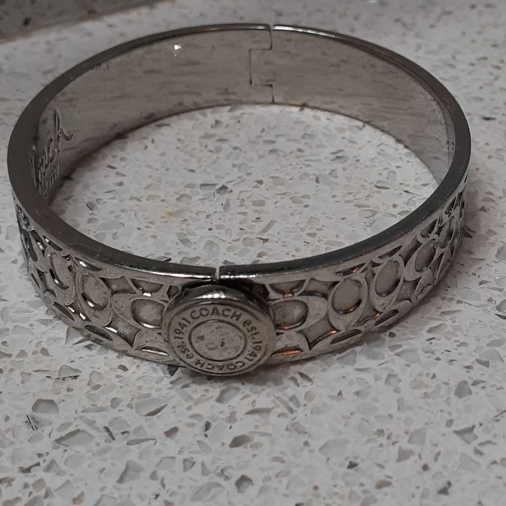 Silver Coach Bangle WClasp 25$